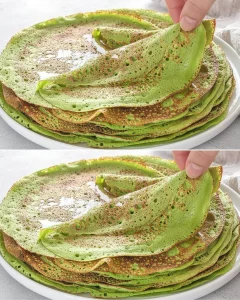 Healthy avocado oat pancakes stacked on a plate with syrup and berries