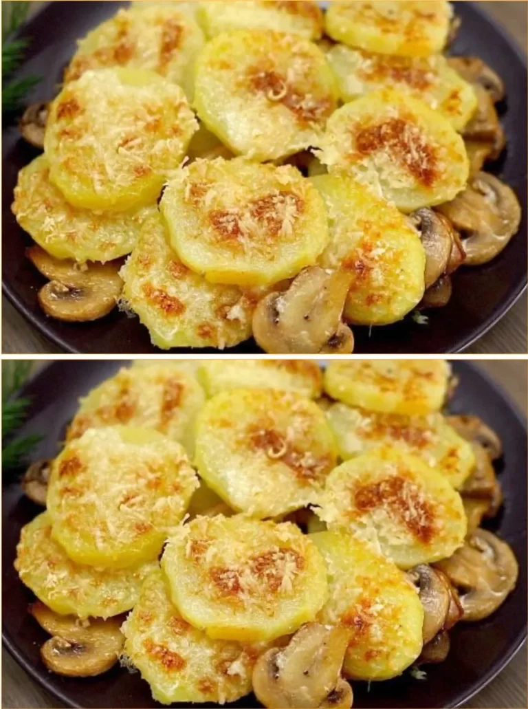 Delicious baked potatoes topped with cheese and mushrooms