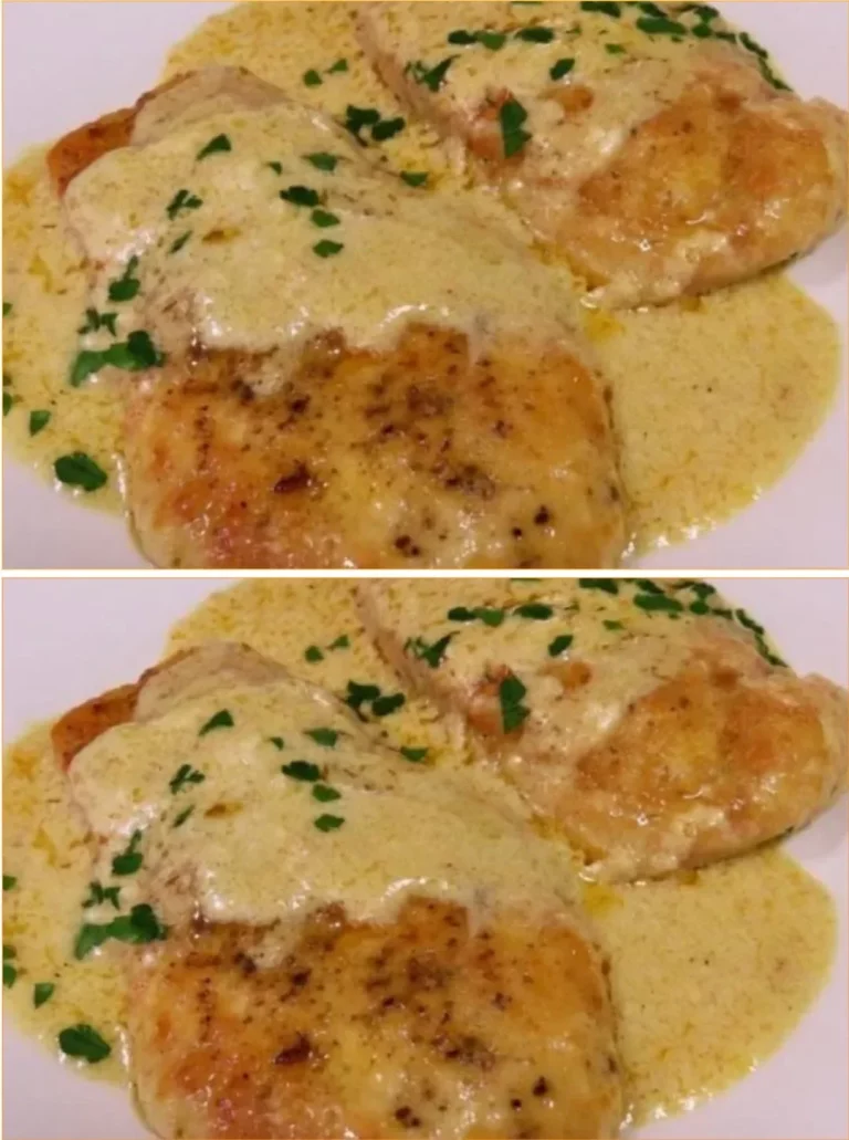Plate of chicken slices in garlic sauce garnished with herbs