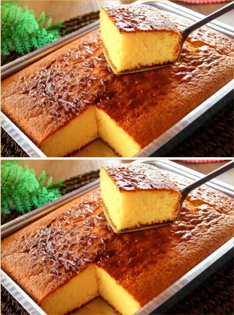 Delicious slice of Cornmeal Cloud Cake topped with cream and berries.