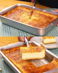 Slice of creamy Brazilian cornmeal milk cake topped with fresh fruit