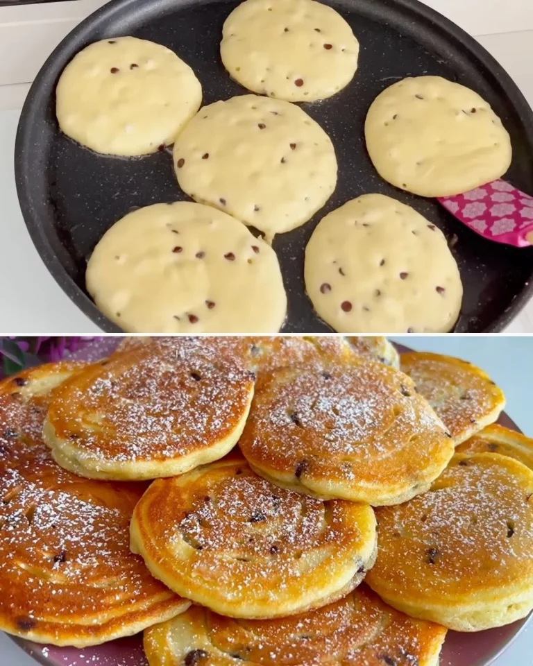 Fluffy homemade yogurt pancakes stacked on a plate with syrup and berries