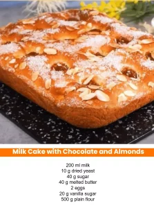 Milk Cake adorned with chocolate and almonds, a delightful dessert option
