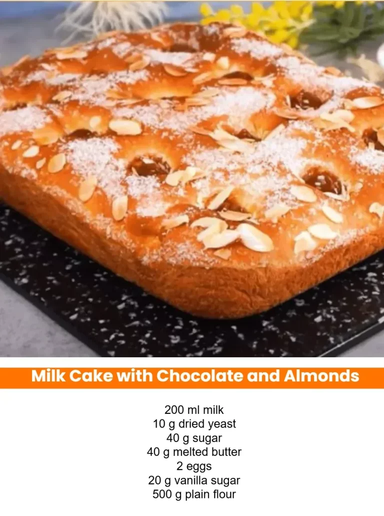 Milk Cake adorned with chocolate and almonds, a delightful dessert option