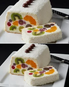 Colorful no-bake fruit mosaic dessert with fresh fruits and cream layers.