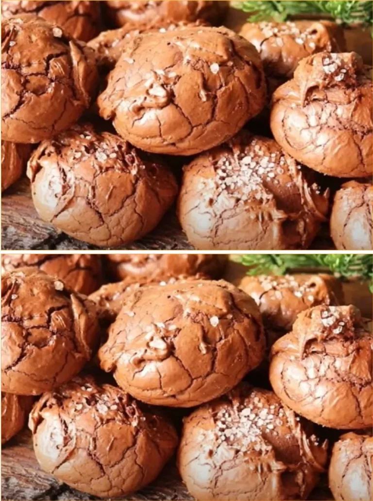 Freshly baked soft chocolate cookies on a cooling rack