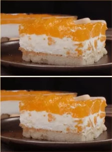 Unbaked sponge cake topped with fresh tangerines for a delightful dessert.