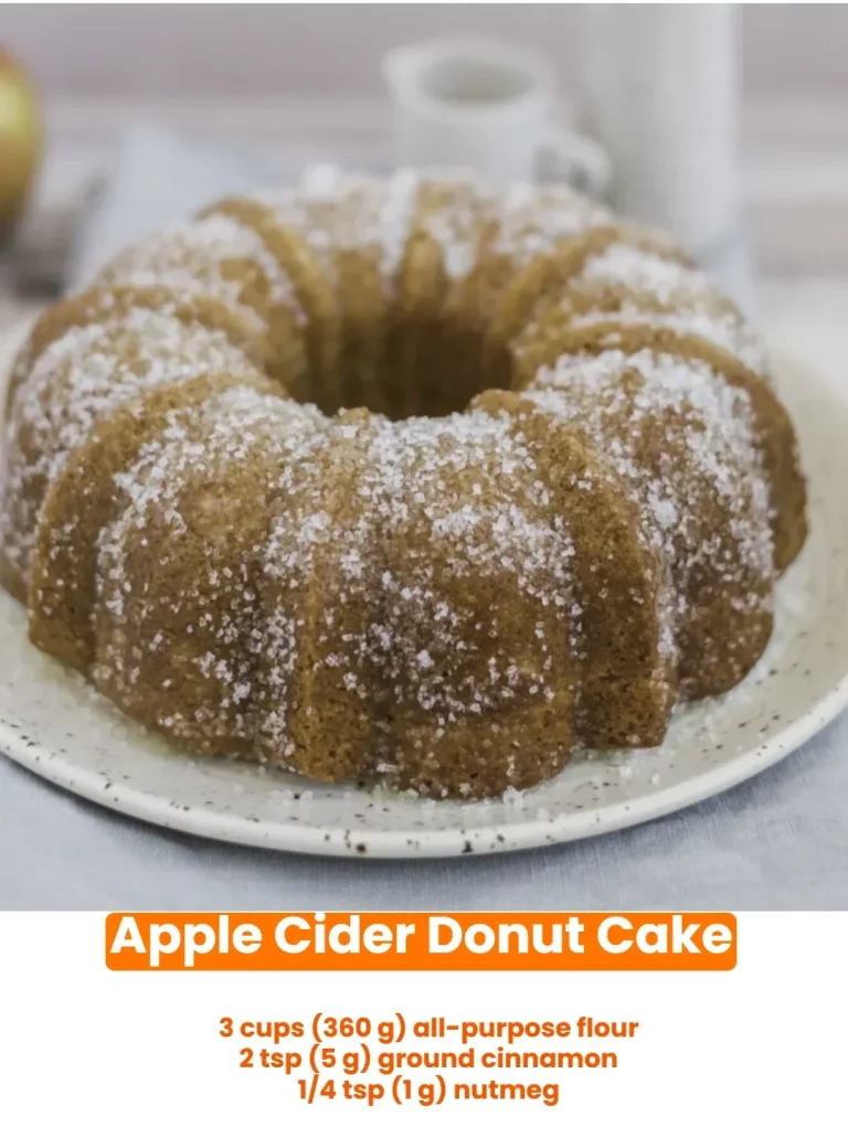 Delicious apple cider donut cake topped with cinnamon sugar