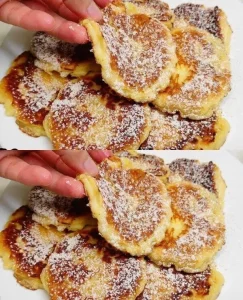 Delicious apple pancakes topped with fresh slices and syrup