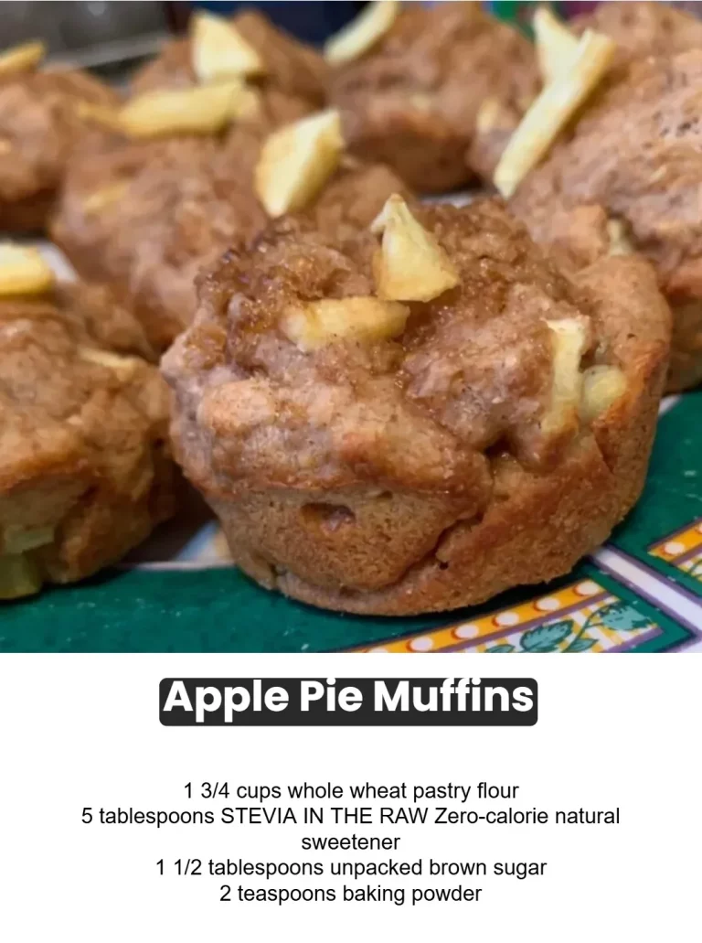 Freshly baked apple pie muffins topped with cinnamon and apples