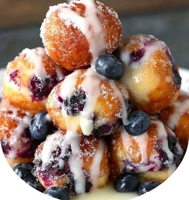 Baked blueberry fritter bites on a plate