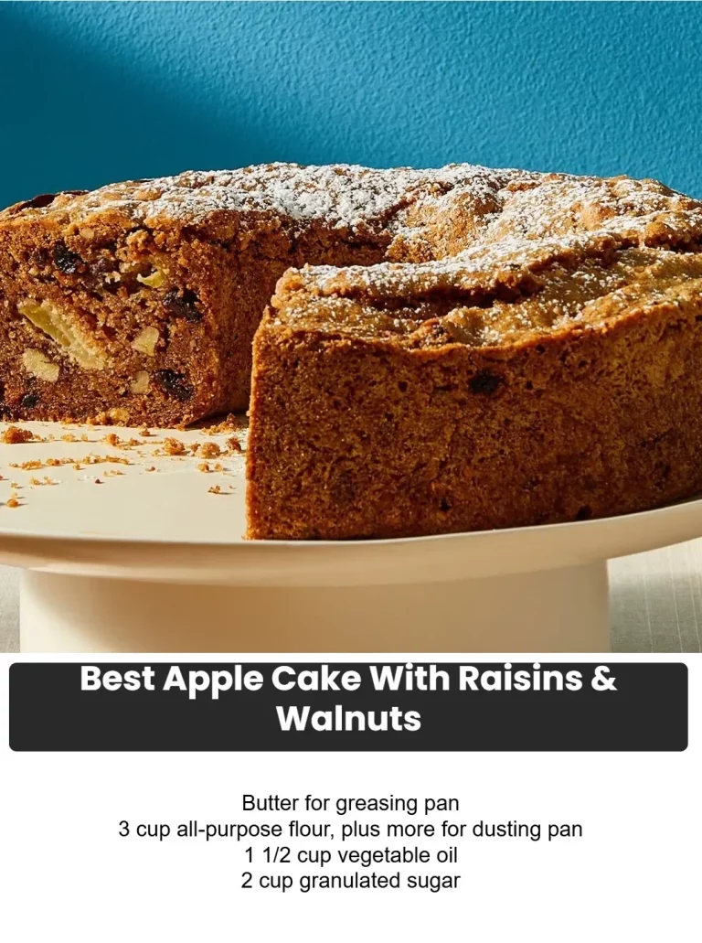 Delicious apple cake with raisins and walnuts on a rustic wooden table