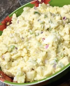 Delicious bowl of the best potato salad with fresh herbs and seasonings