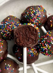Delicious Brownie Cake Pops decorated with chocolate and sprinkles