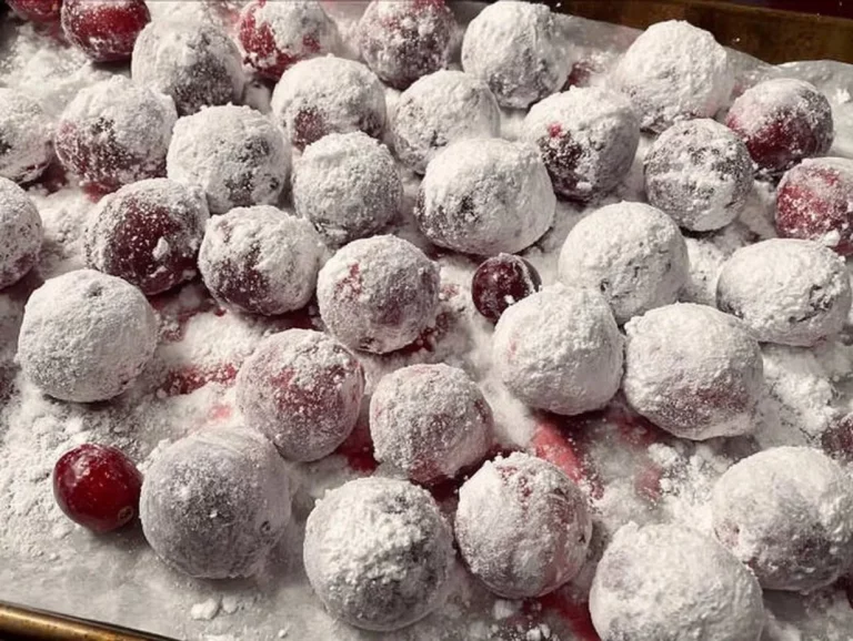 Bowl of sweet and tangy candied cranberries ready for festive meals.