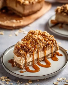 Delicious caramel apple cheesecake bars topped with caramel drizzle