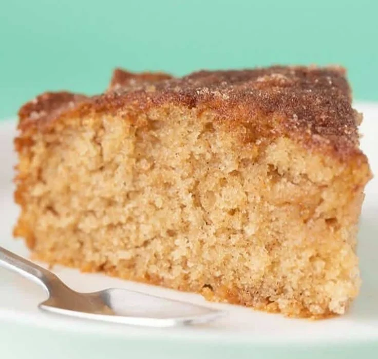 Homemade Cinnamon Tea Cake topped with a sprinkle of cinnamon sugar