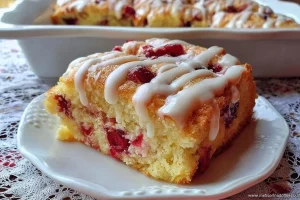Freshly baked Cranberry Orange Butter Swim Biscuits on a rustic table
