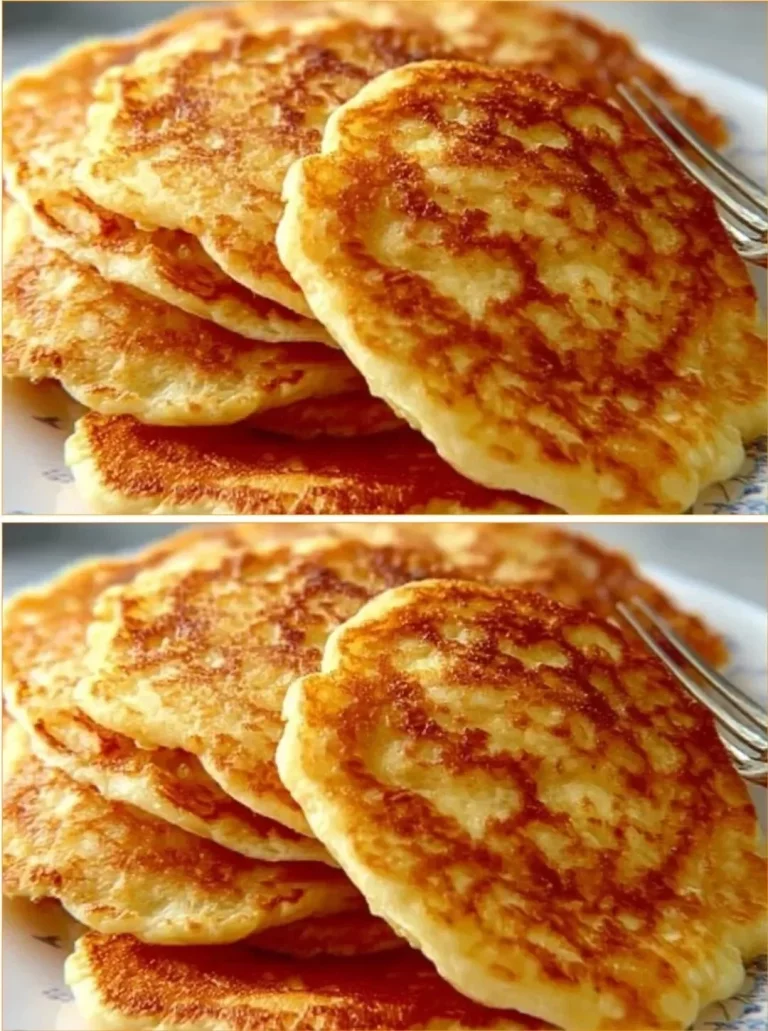 Plate of crispy potato pancakes garnished with sour cream and chives