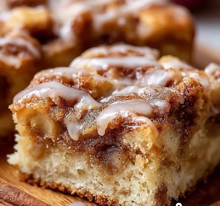 Delicious easy cinnamon apple cake with apples and cinnamon on a white plate