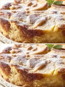 Sliced easy French Apple Cake on a beautiful plate with apples and cinnamon