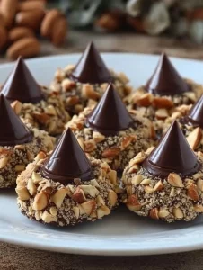 Delicious Nut Nests filled with Nutella, garnished with nuts and chocolate.