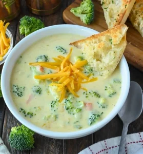 Bowl of creamy broccoli cheese soup inspired by Panera recipe