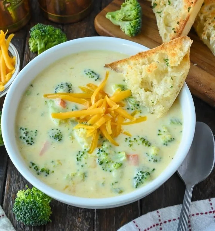 Bowl of creamy broccoli cheese soup inspired by Panera recipe