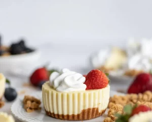 Small Batch Greek Yogurt Cheesecake Cups topped with fresh berries