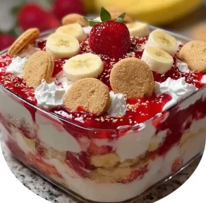 Delicious Strawberry Banana Pudding served in a bowl with fresh strawberries and bananas