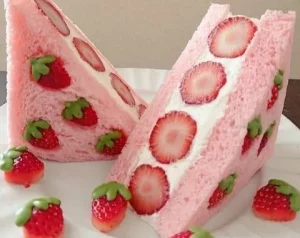 Delicious strawberry sandwich with fresh strawberries and cream.