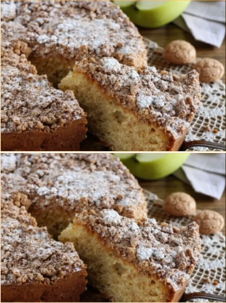 Slice of Apple Amaretti Cake topped with amaretto cream and fresh apples.