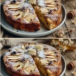 Freshly baked apple cake with slices and apple garnishes