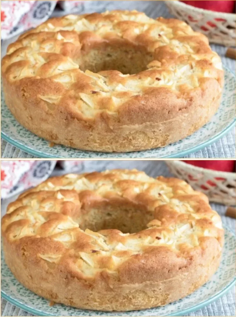 Freshly made apple doughnut topped with glaze and cinnamon sugar
