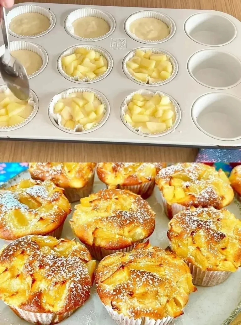 Sliced apple yogurt cake on a plate, garnished with fresh apples and mint.