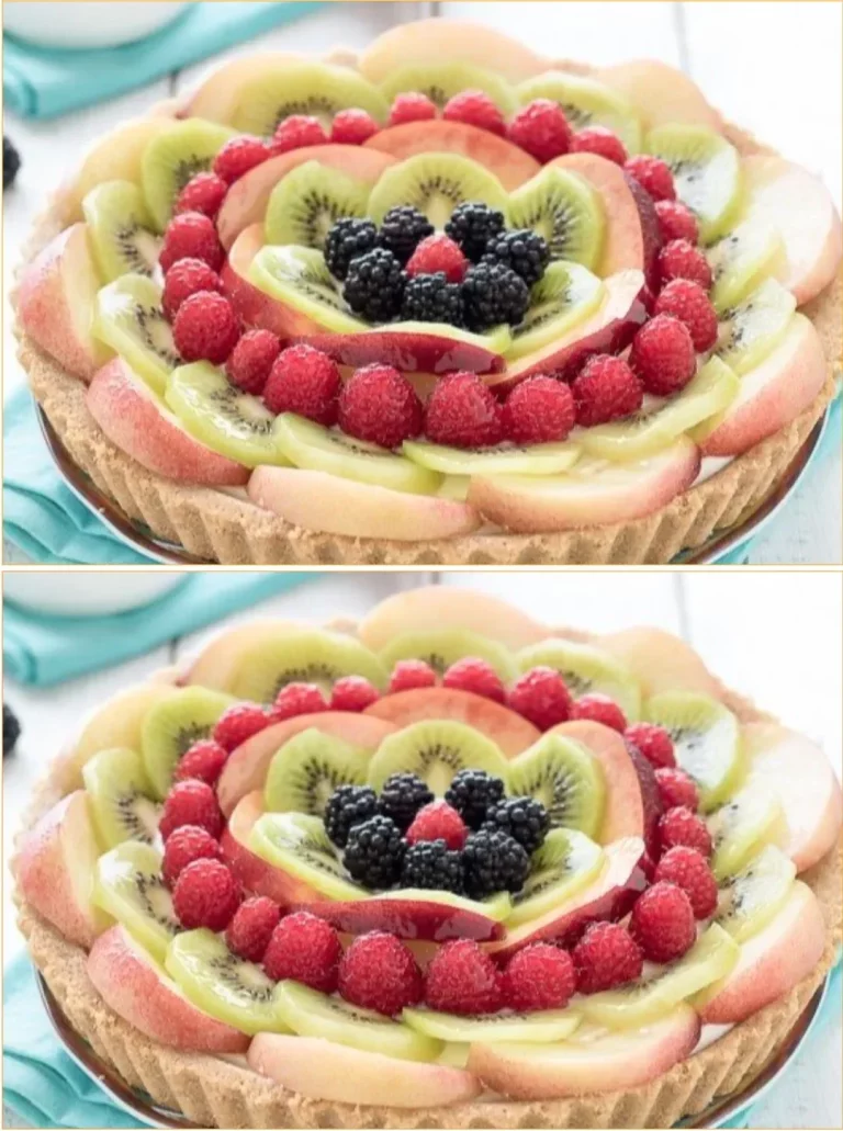 A beautiful cold fruit tart topped with fresh seasonal fruits
