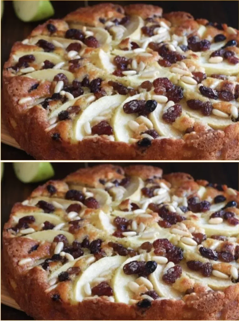 Slice of Grandma's apple cake with fresh apple slices and cinnamon on top