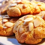 Delicious homemade Bethmännchen Cookies on a decorative plate