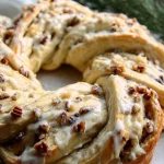 Holiday Breakfast Wreath with Cranberry Almond Filling arranged on a festive table