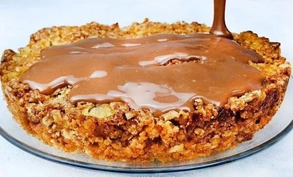 Delicious homemade Oatmeal Apple Cake topped with fresh apples and spices