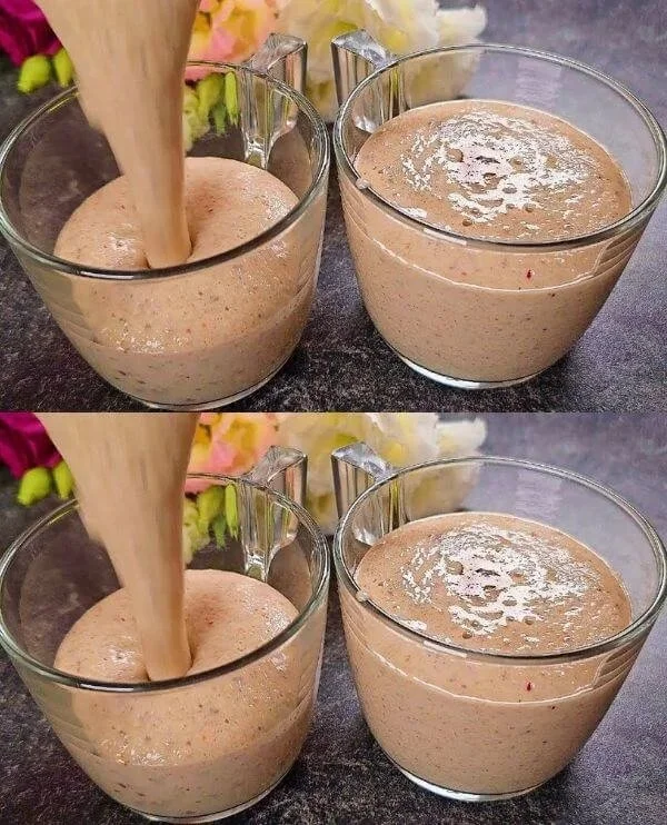Bowl of oatmeal topped with fresh apples and dates