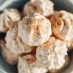 Rustic Almond-Orange Macaroons with a golden crust and almond flakes