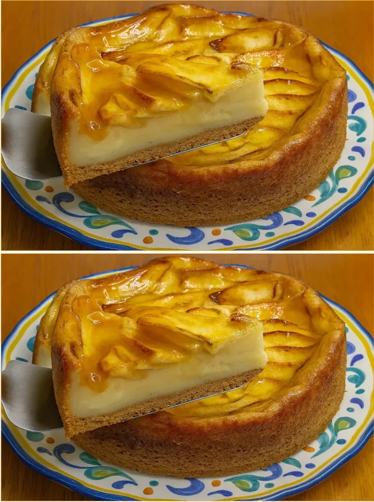 Deliciously creamy apple cake with a biscuit base and jam topping.