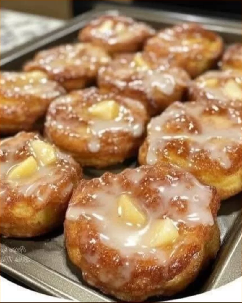 Delicious homemade apple fritters topped with icing and cinnamon sugar