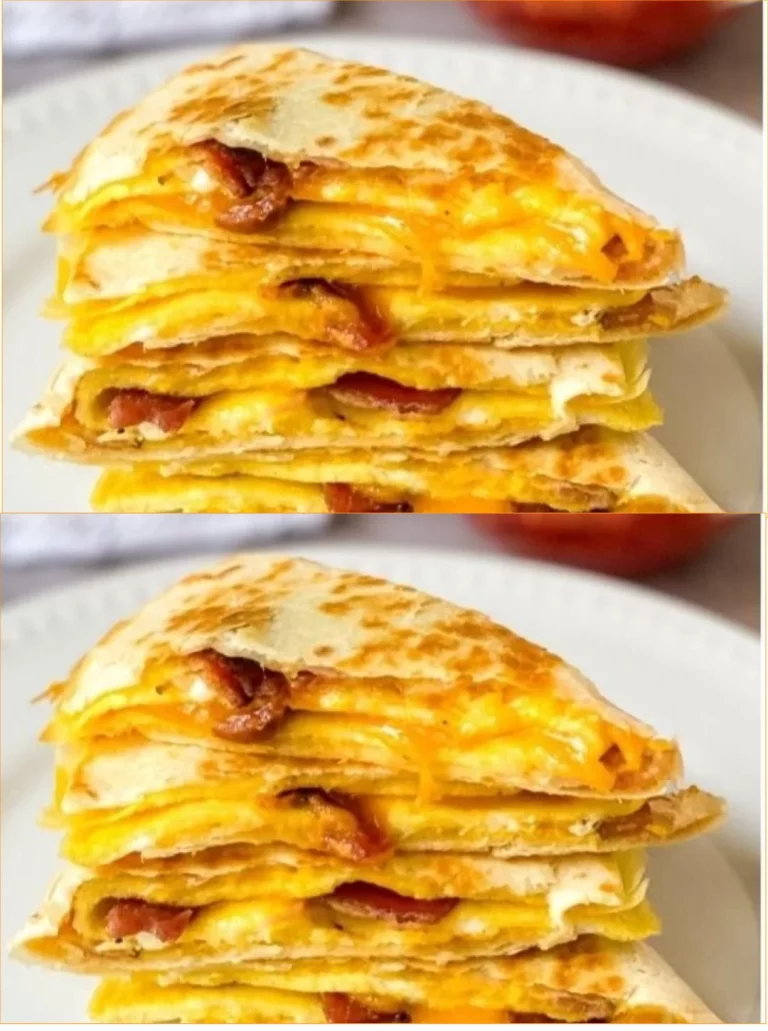 Bacon, egg, and cheese breakfast quesadilla served on a plate