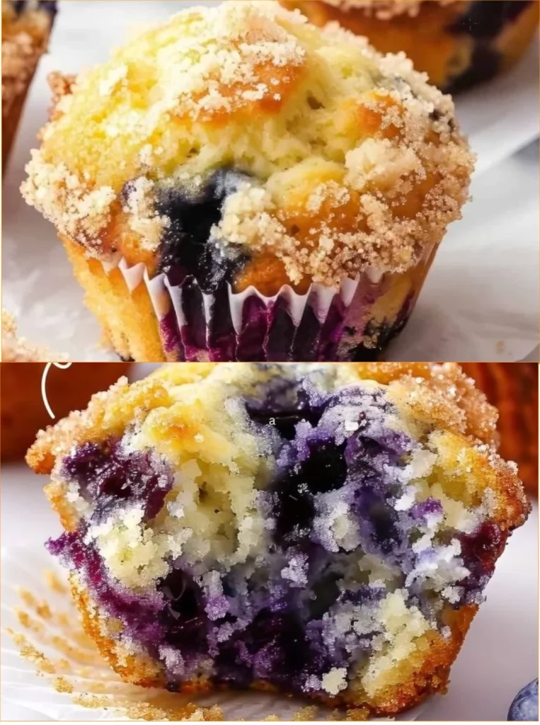 Freshly baked blueberry muffins with a golden top and juicy blueberries