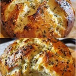 Golden-brown Garlic Herb Dutch Oven Bread loaf fresh out of the oven