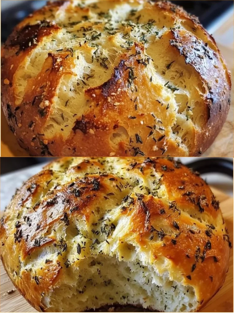 Golden-brown Garlic Herb Dutch Oven Bread loaf fresh out of the oven