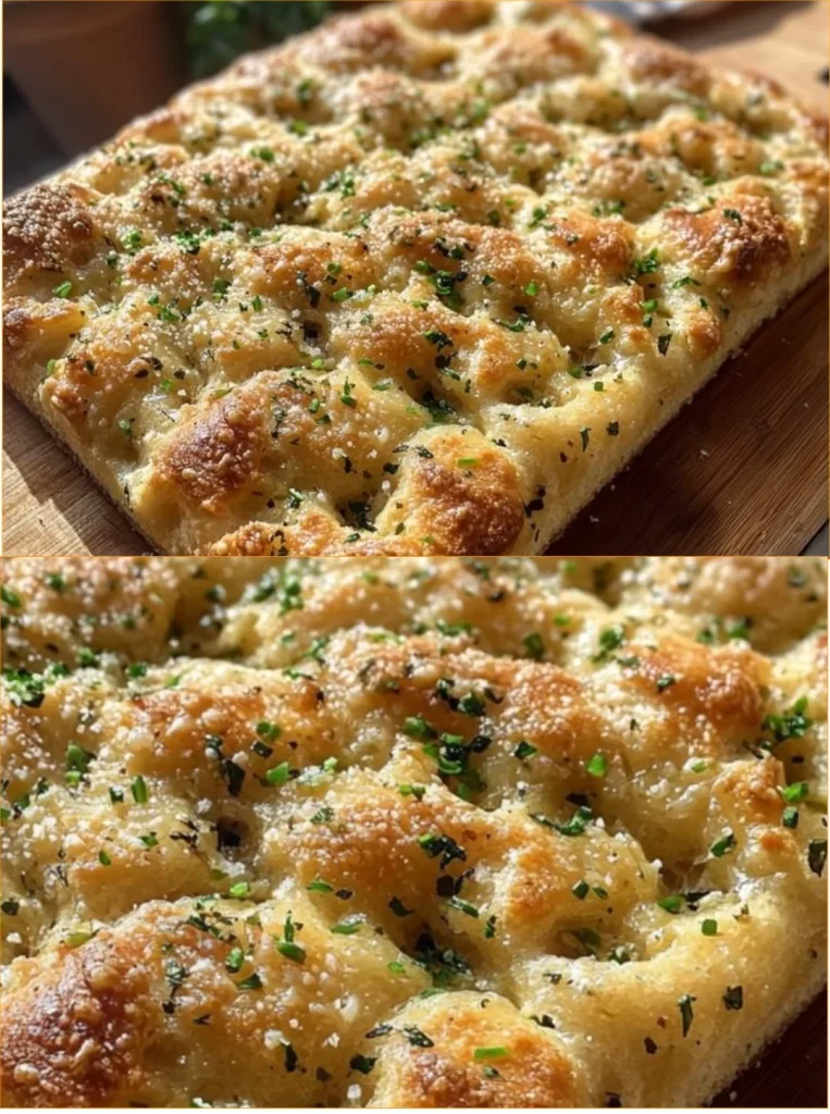 Freshly baked Garlic Parmesan Focaccia Bread with herbs and olive oil