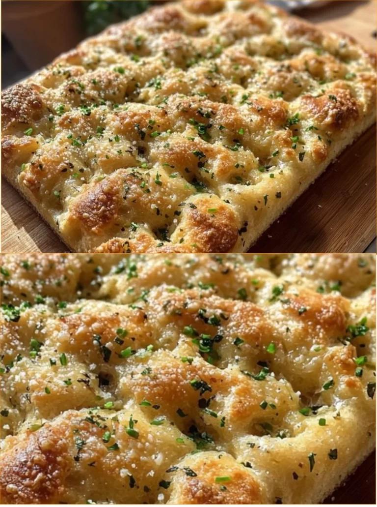 Freshly baked Garlic Parmesan Focaccia Bread with herbs and olive oil